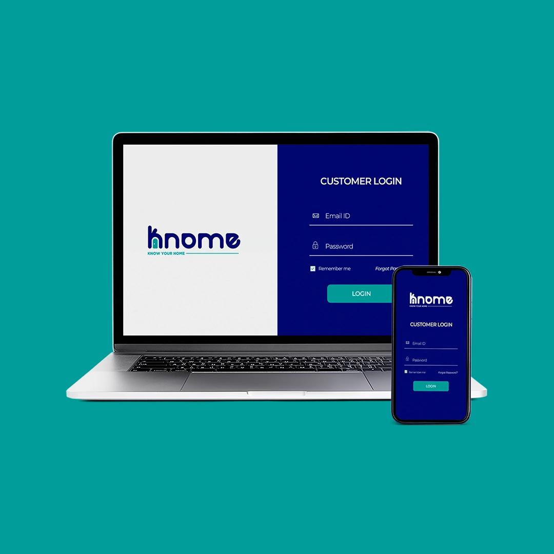 Um notebook junto com um celular, ambos com uma interface de login da empresa Knome caracteristica pela cor azul escuro
